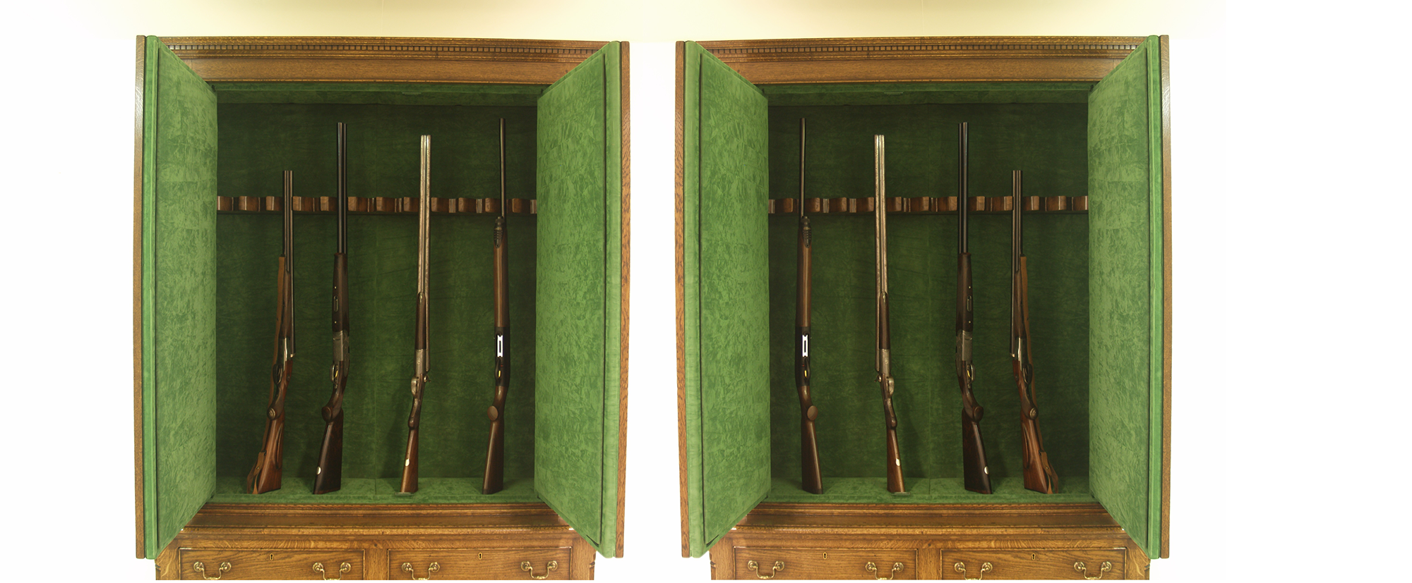 Bespoke Gun Rooms and Gun Cabinets 9 Close detail of guns standing in a felt-lined barrel rack inside a bespoke oak gun cabinet