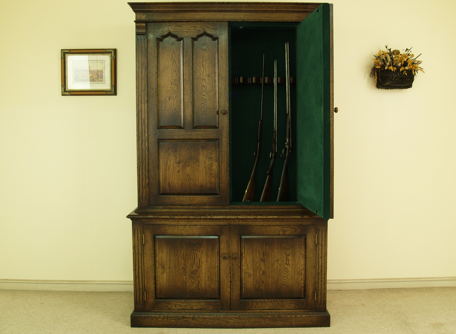 Concealed Gun Storage 4 Timber double door gun cabinet forming part of a run of fitted joinery