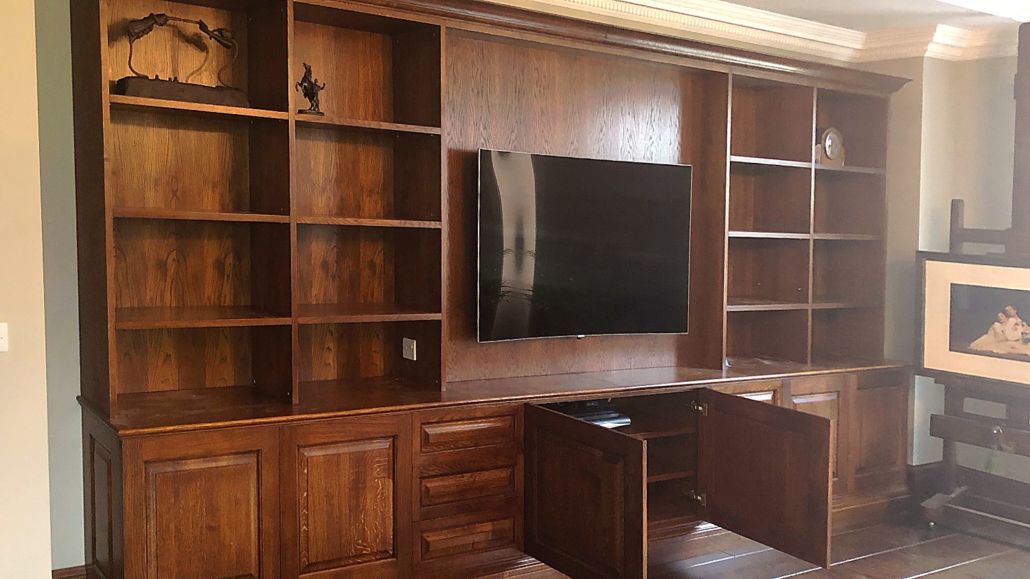 Oak TV cabinet and fitted bookcase