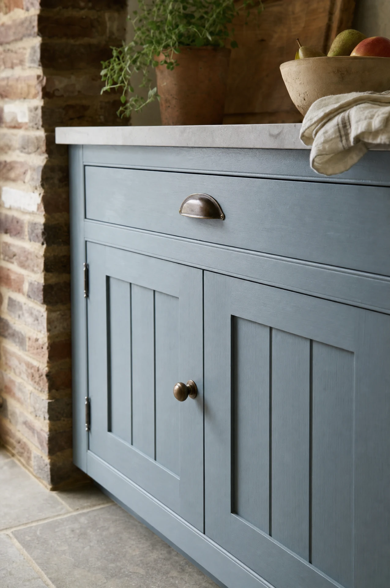 V-groove panel detail on painted shaker cabinetry