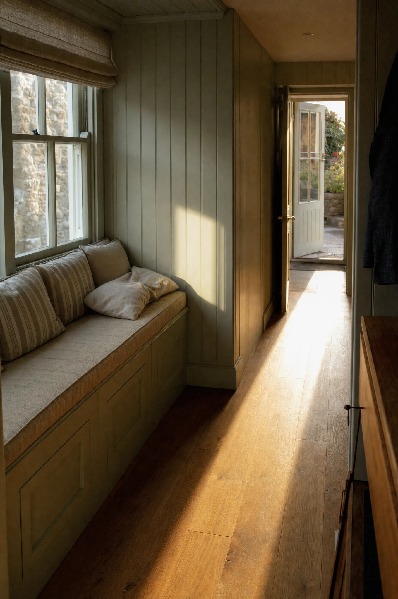 Painted tongue-and-groove panelling and a fitted window seat in a Suffolk coastal residence — Reeve & Co design study